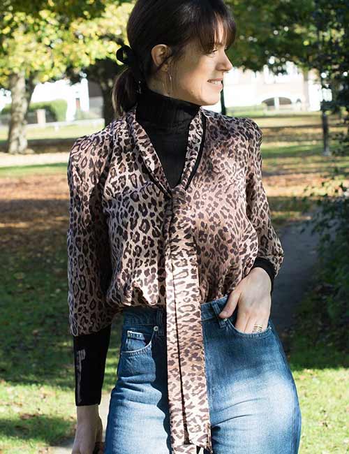 High waisted jeans with an animal print top