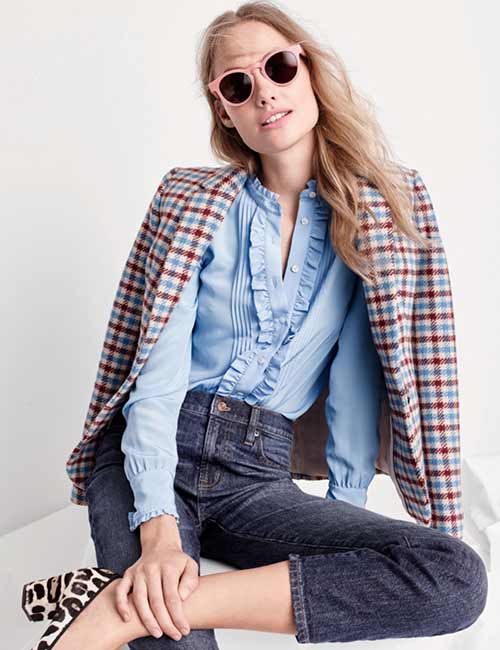 High waisted jeans with a button-down shirt and a jute jacket