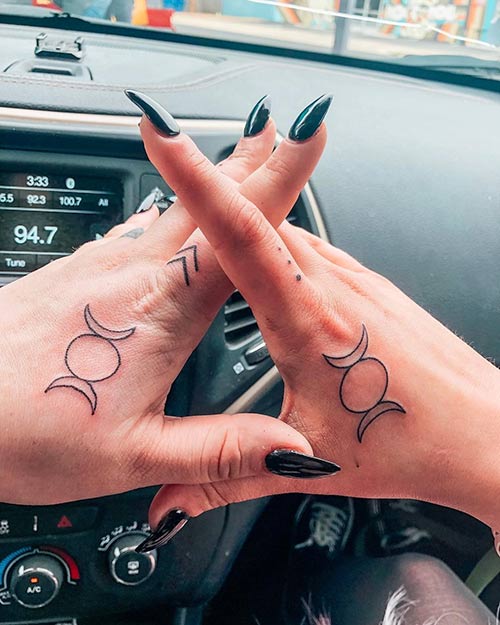Small geometric hand tattoo design