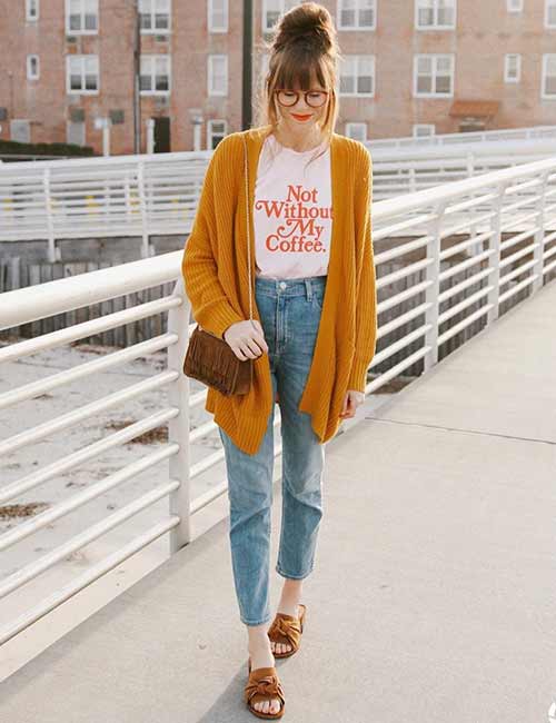 High waisted jeans with a caption t-shirt and bold color long sweater