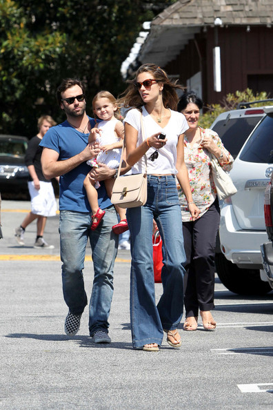 Alessandra was spotted out in a pair of “Bette” high-rise wide leg jeans with her family.