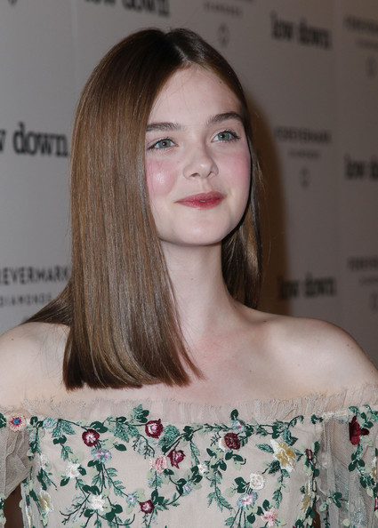 Elle Fanning kept it minimal with this sleek, center-parted hairstyle when she attended the 'Lowdown' premiere.