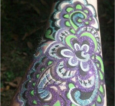 Floral forearm glitter tattoo