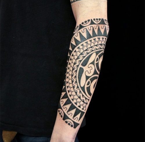 Polynesian sun tattoo symbolizing rebirth