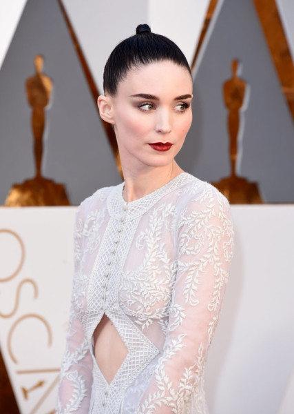 Rooney accented her ultrafair complexion with gray shadow and a defined red lip.