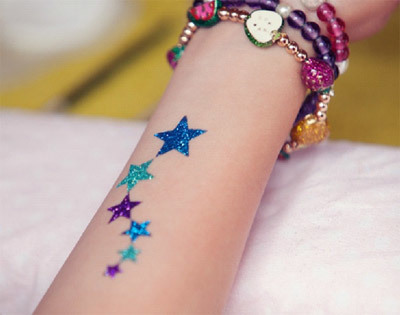 Glitter star tattoo